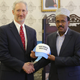 US Ambassador to Somalia Stephen Schwarz presents the President of Somalia Mohamed Abdullahi Mohamed with a hat that reads “Make Somalia Great Again” (Twitter)